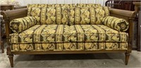 (I)MCM Floral loveseat, wood frame with caned side