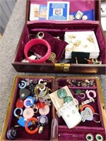 Two jewelry boxes w/lots of pierced earrings