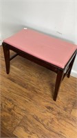 Wood bench with pink cover, 14x23 top, 17 in ht