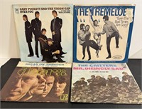 Four Vintage 45rpm Records NM