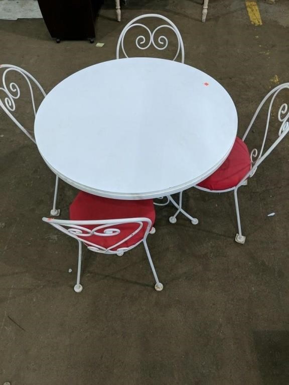 Table and 4 Padded Chairs