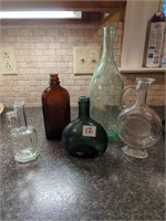 5 vintage bottles
