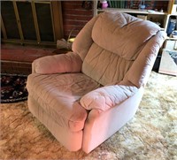 Beige rocker recliner