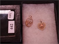 Two yellow gold pendants, one marked 14K
