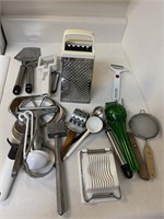 Kitchen gadgets, Graters, cheese slicer, juicer