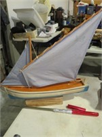 SAIL BOAT WITH A TELESCOPING FISHING ROD