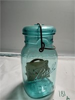 Ball.
 Ideal Mason jar with glass lid.