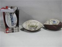 Three Dallas Cowboys Footballs