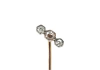 Good Edwardian diamond & rose gold stick pin