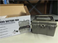 Camera battery box w/ battery.