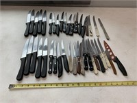 39 steak knives, 1 cheese spreader, 1 copper