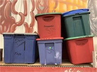 Assorted storage tote bins. Most with lids.