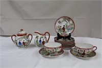 Vintage ceramic Asian, two teacups, ten saucers,