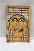 Asian handmade wooden mask used in religious