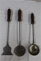 Three pewter kitchen utensils