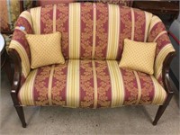 Red/Gold Upholstered Loveseat - with Accent