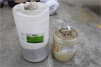 Containers of Saw Coolant & Potting Soil