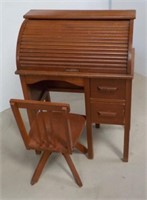 Small roll top desk with chair kid size.