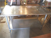 Stainless steel table 60x30 (corner is dented)