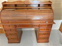 nice roll top desk, has some damage