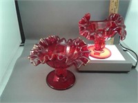 Pair of LG Wright red glass candle holders