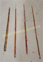 3 bamboo 2 piece fishing poles and 1 bamboo