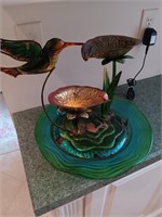 Hummingbird fountain with light glass base paint