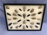 Shadow box with large variety of stone and obsidia