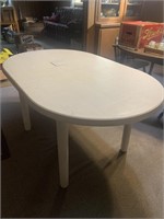 Plastic oval table-patched
