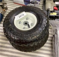 2 10" pneumatic tire hub with 4.10/3.15–4 ties.
