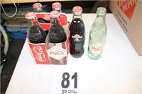 (6) Collectible Coca-Cola Bottles (5 Unopened)
