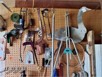 Contents of pegboard, air pump, bungee cords,