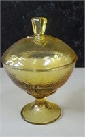Amber colored glass compote approx 6 inches tall