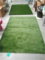 Two pieces of artificial turf.  Both are 7 ft by