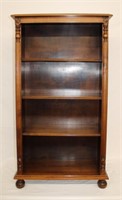 Walnut 4 tier open book shelf on bunn feet, with