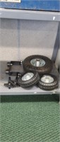 Three pneumatic wheels and two axle brackets, new