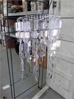Three acrylic chandeliers