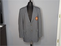 Grey sport jacket with Blue Grass patch