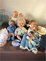 Dolls made by Reliable, with assorted doll clothes