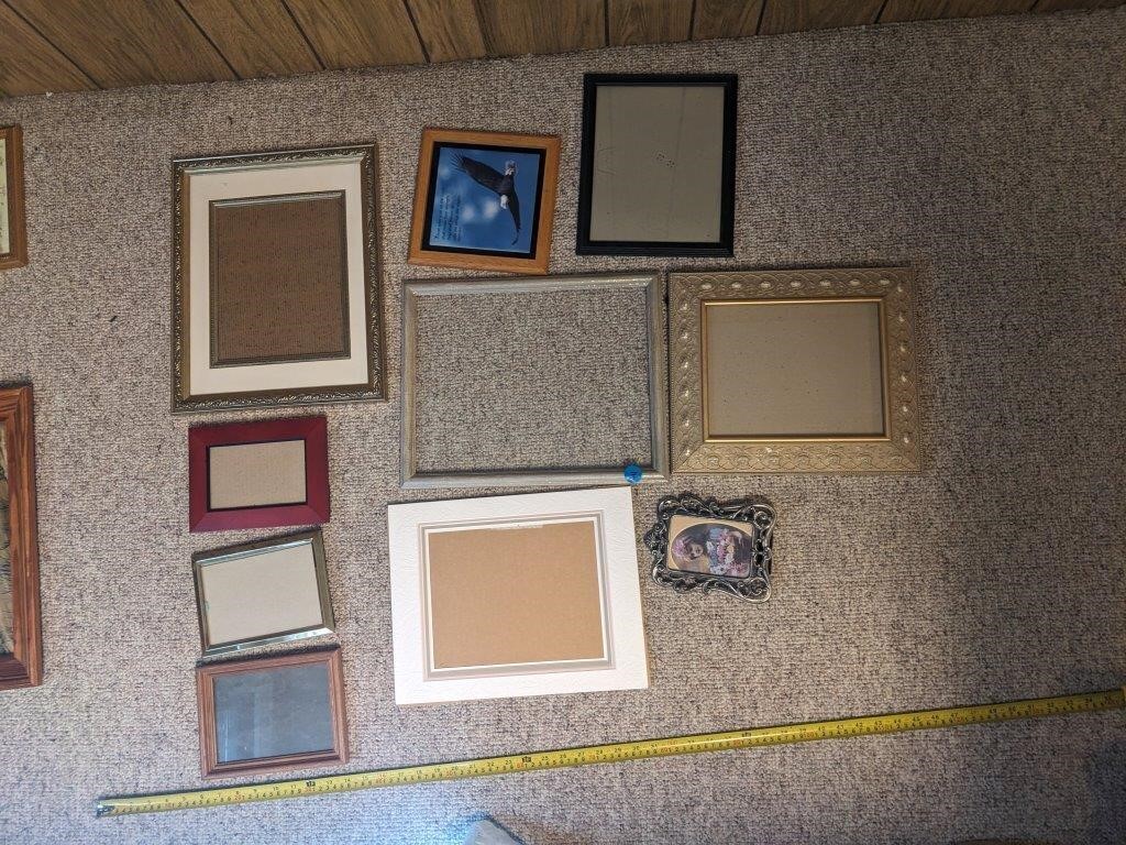 Assortment of medium and small picture frames
