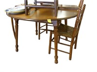 Five piece maple dinette set including four