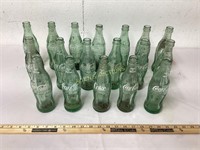 18 GREEN COCA-COLA BOTTLES