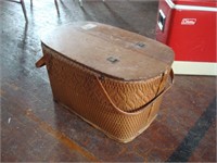 Woven wooden picnic basket with hinged lid