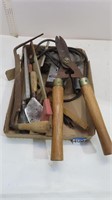 limb clippers, jigsaw, assorted tools