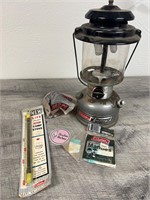 Glass Gas Coleman lantern and accessories