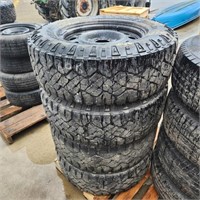 4 - 275/70R18 Tires on Steel Rims 40% Tread