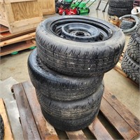 4 - 215/55R16 Tires on Steel Rims 70% Tread