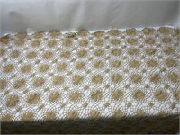 Crocheted lace tablecloth and a variety of doilies