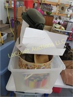 assorted  womens hats boxes in tote