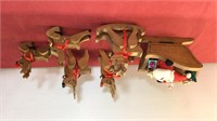 Wooden sleigh and reindeer with Santa